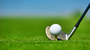 golf ball and club